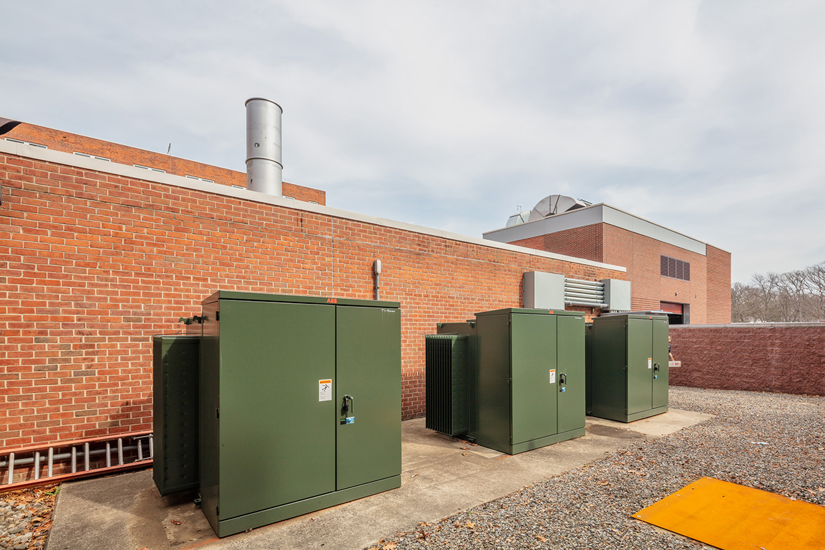 Enclosed electrical transformers on a roof