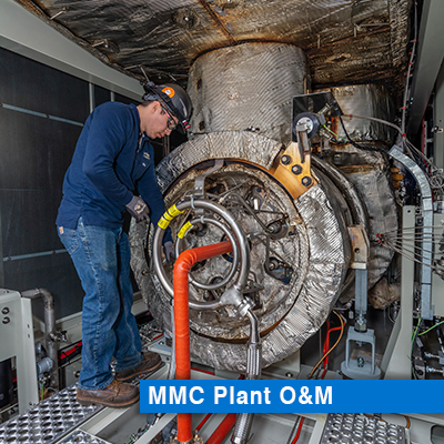 BC Energy employee performing maintenance on a natural gas turbine.