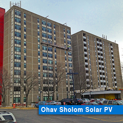 Solar thermal panels on the side of Ohav Sholom, an apartment building.