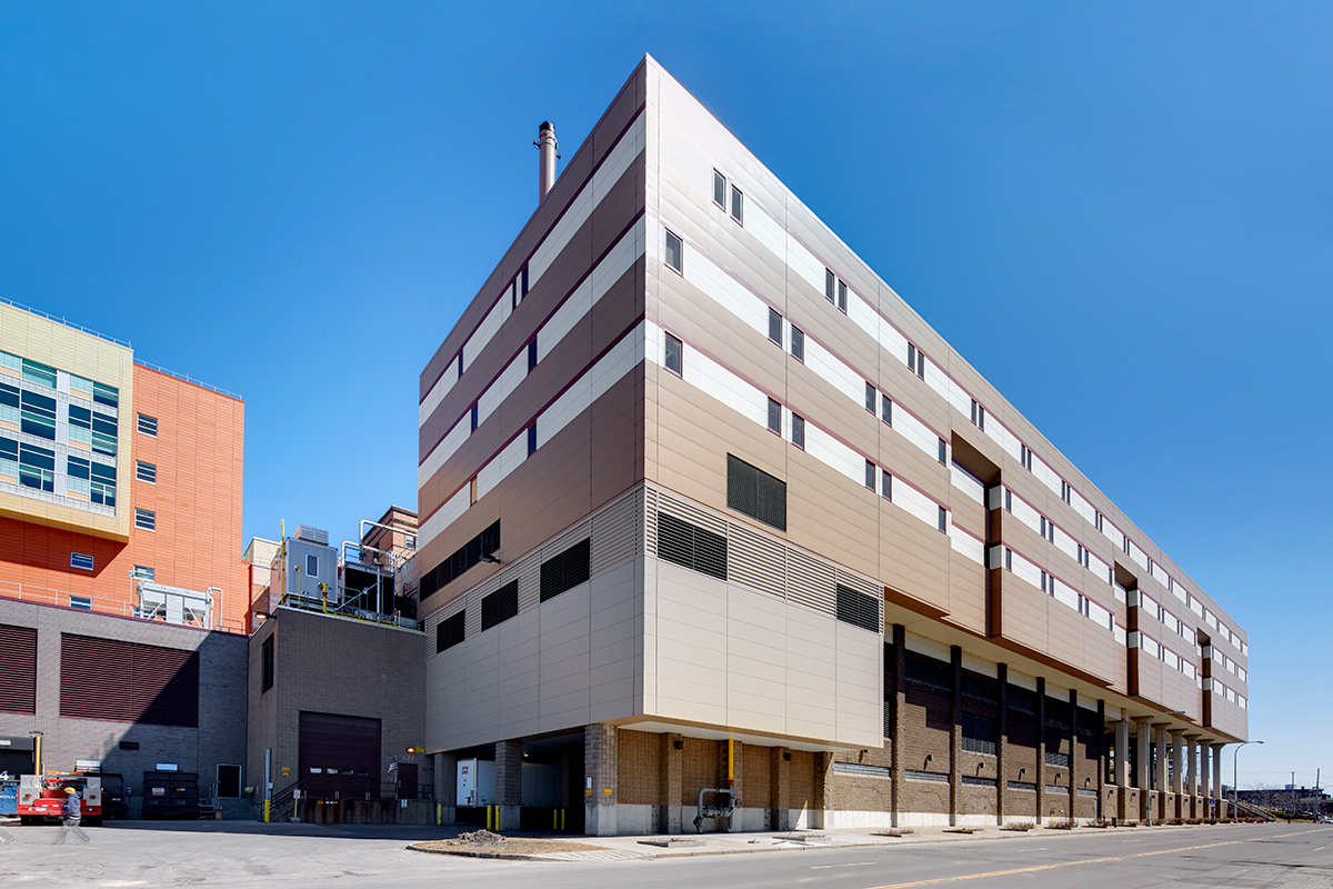 St. Joseph's Hospital featuring its new cogeneration plant that was strategically constructed underneath a building over existing loading docks.