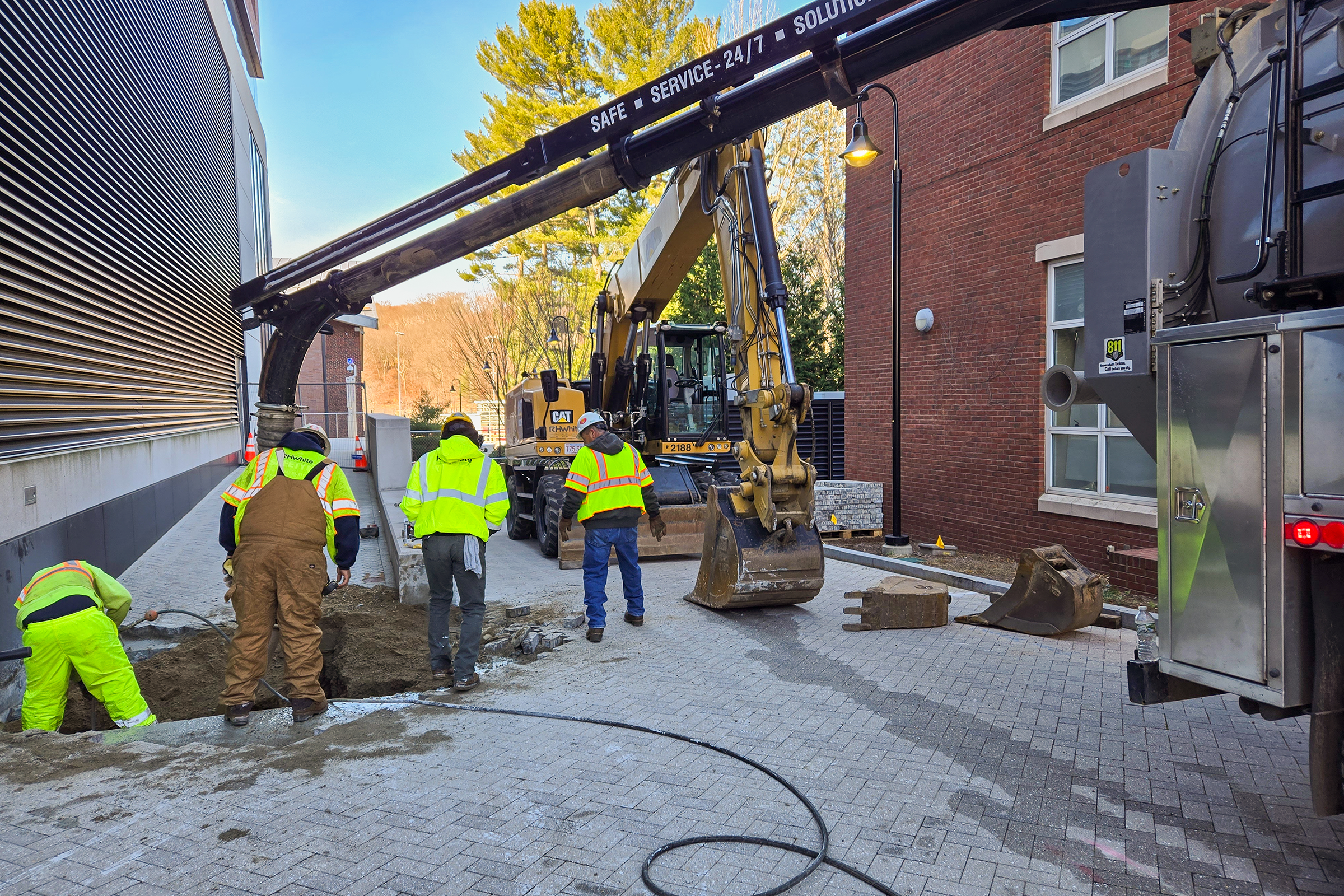 Construction crews installing new underground steam piping at Worcester Polytechnic Institute.